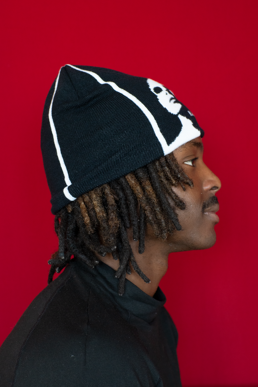 Le bonnet noir miroir